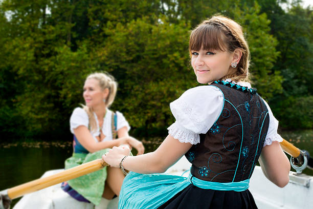istock two woman in a rowing boat 518352009