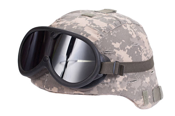 istock us army kevlar helmet with camouflage cover and protective goggles 518352283