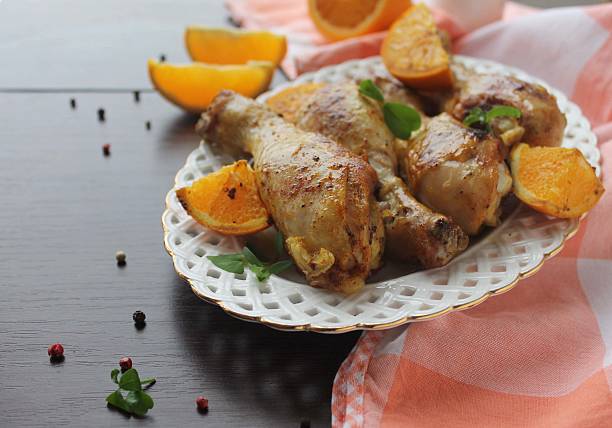 istock Roasted chicken legs in cast iron skillet, selective focus 518355094