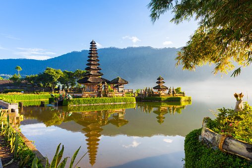 Pura Ulun Danu Bratan at sunrise, famous temple on the lake, Bedugul, Bali, Indonesia.