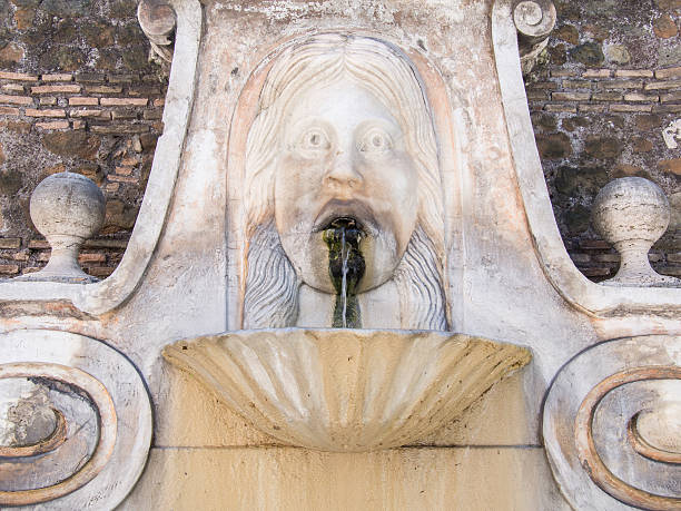 istock Old Roman Fountain 518355169