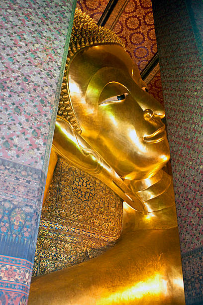 istock Giant image of reclinig Buddha 518355693