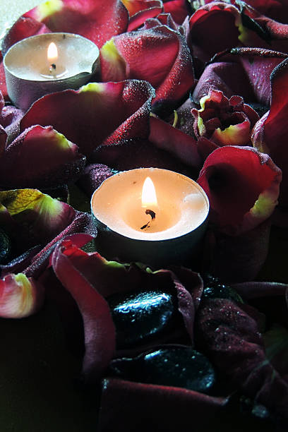 istock Petals of roses and candles 518356850