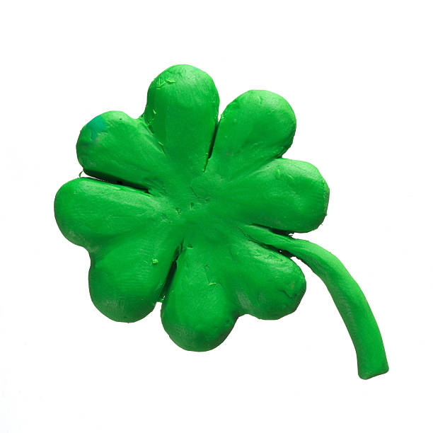 istock St Patrick holiday symbol - clover. Made of Plasticine 518357145