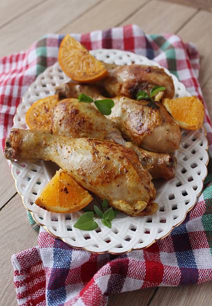 istock Roasted chicken legs in cast iron skillet, selective focus 518357280