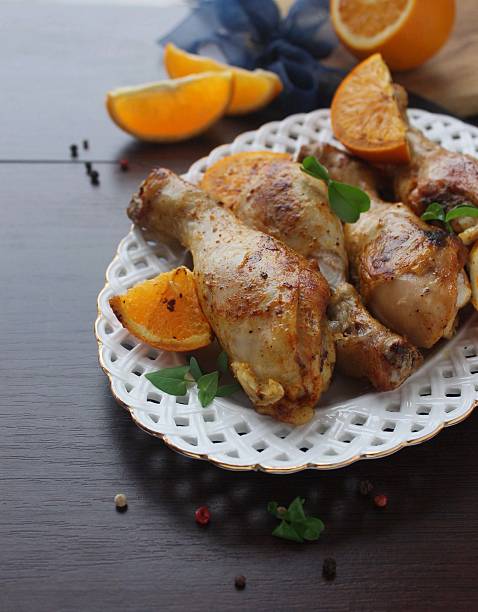 istock Roasted chicken legs in cast iron skillet, selective focus 518357338