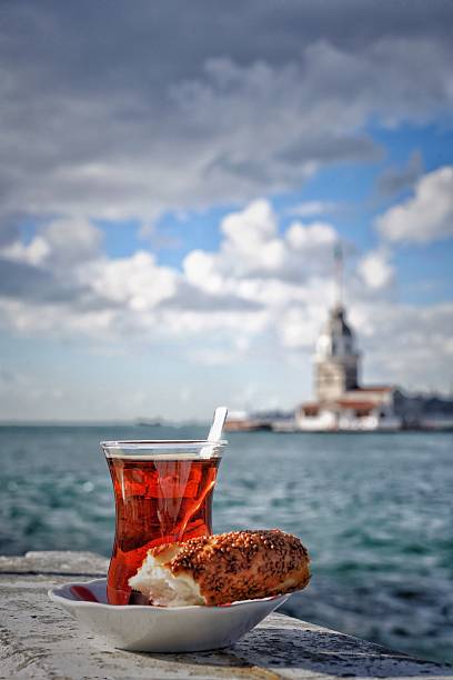 istock turkish tea and bagel against sea 518357438