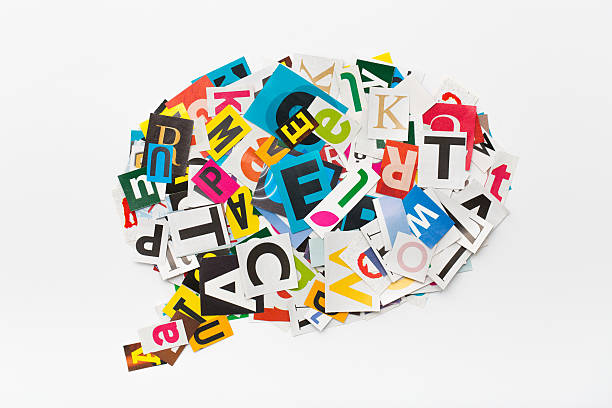 Speech bubble letters in cut out magazine. The colorful speech bubble in cut out magazine letters. chaos stock pictures, royalty-free photos & images