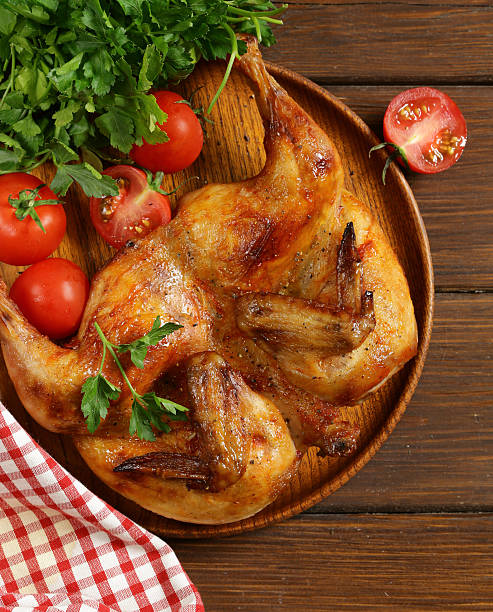 istock grilled whole chicken with herbs and spices 518360782