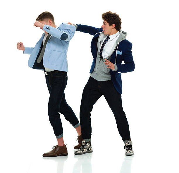 istock Man stopping friend from fighting 518368120