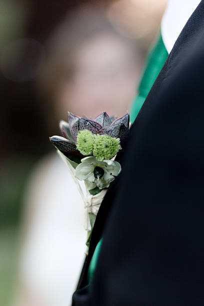istock Bridegroom with a flower on the jacket 518368788