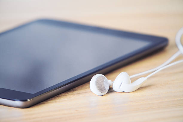 istock Tablet and headphones closeup 518368794