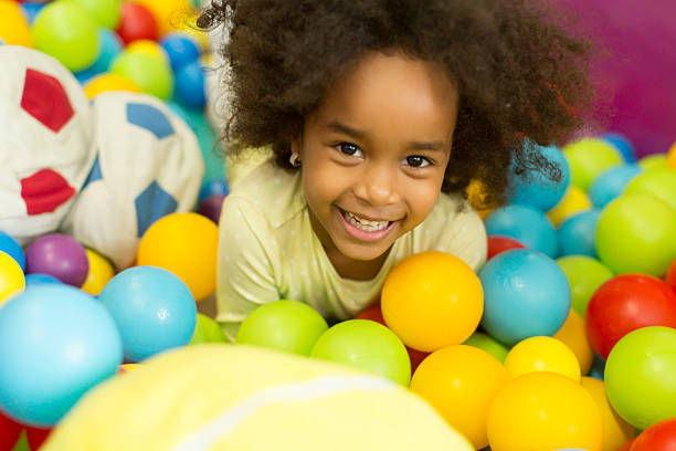 Black little girls in the playroom stock photo