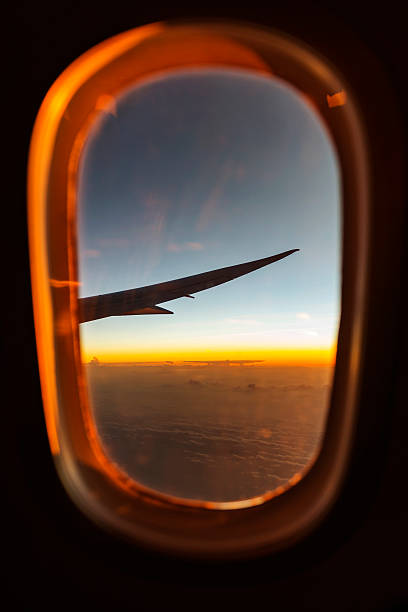 istock Looking out the window of a plane 518370340
