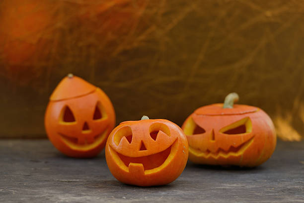 istock Halloween pumpkin on wooden planks 518377329