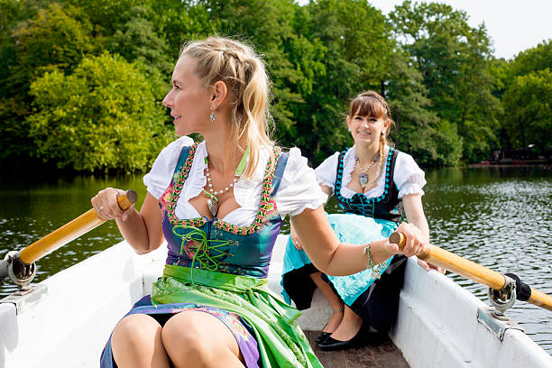 istock two woman in a rowing boat 518378467