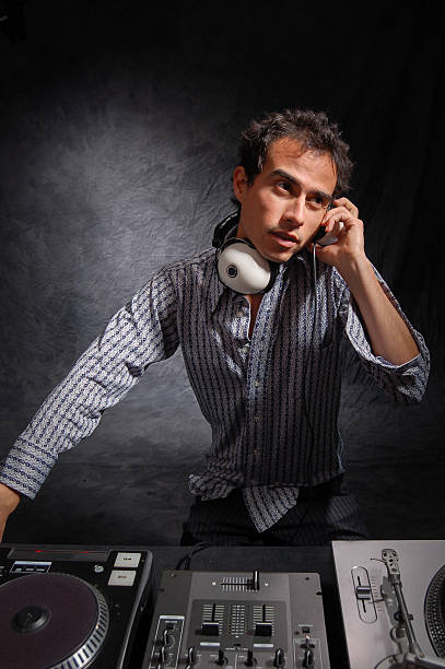 istock Night Club DJ Spinning Music 518383318