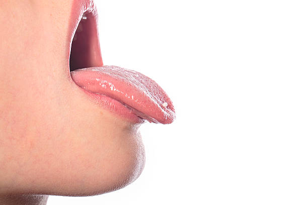 istock homeopathic globules on the tip the tongue 518383935