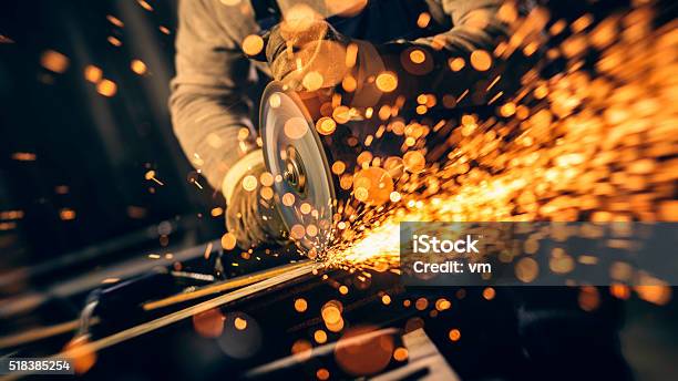Industrial Worker With Work Tool Stock Photo - Download Image Now - Industry, Steel, Sparks