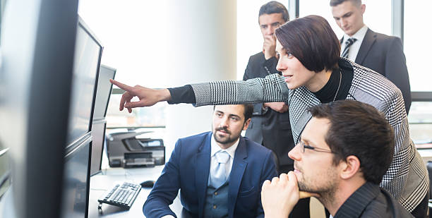 istock Business team working in corporate office. 518385444