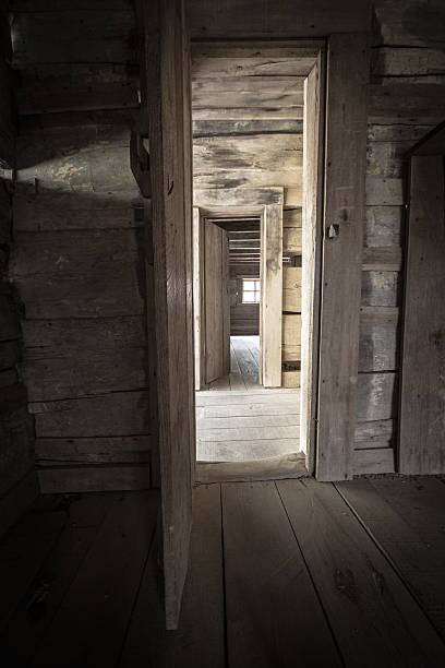 istock Hallway With Open Doors And Sunlight In Vertical Orientation 518386346