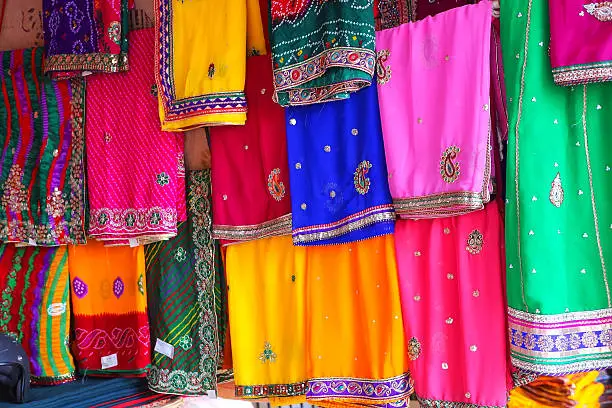 Display of colorful saris at Johari Bazaar in Jaipur, India. Jaipur is the capital and the biggest city of Rajasthan.