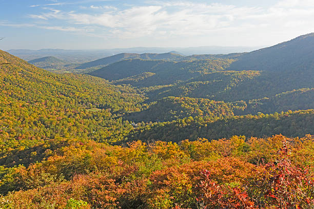 istock Shadows Moving into a Mountain Valley in Fall 518394104