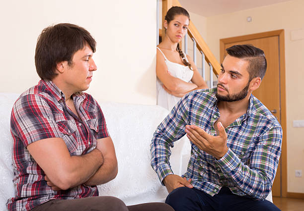 istock Quarrel with neighbour indoor 518394780
