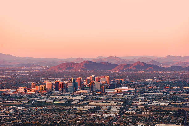 Phoenix Arizona Phoenix Arizona with its downtown lit by the last rays of sun at the dusk. arizona stock pictures, royalty-free photos & images