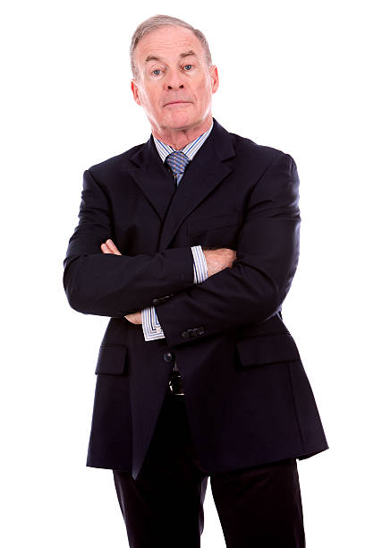 istock mature man in suit 518396648