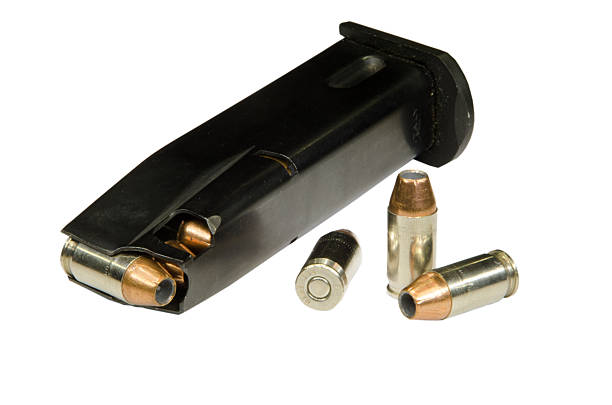 istock Hollowpoint bullets and magazine 518398549