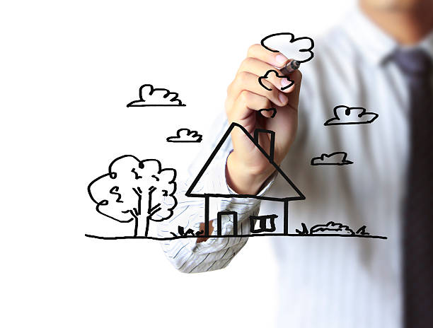 istock hand drawing house in a whiteboard 518398669