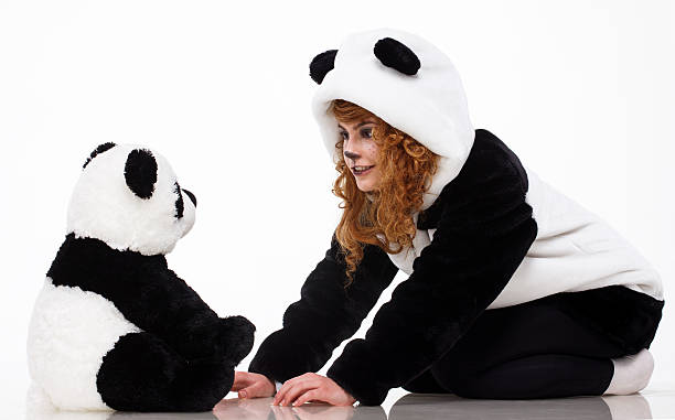 istock Woman and panda - Stock Image 518399827
