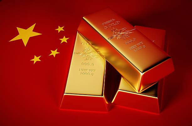 3d Photo-realistic image of golden bricks with china background