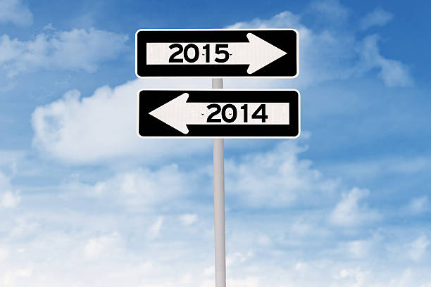 istock Signpost with number 2015 and 2014 518401895