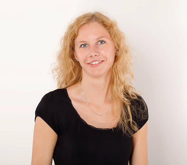 istock Young Woman Smiling Portrait. 518402999