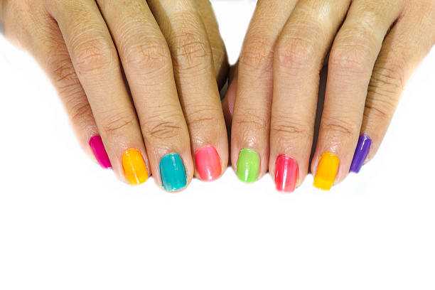 istock Multi-colored the hands with a bright nail polish 518403089