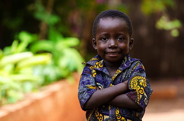 istock Lifestyle: Proud African Boy Posing with Arms Crossed 518403241