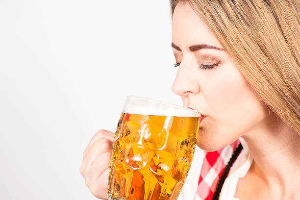 istock Woman about to drink a cold beer. 518403371