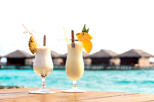 Two cocktails on tropical beach vacation in Maldives