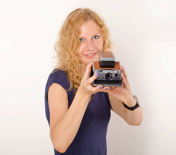 istock Woman With Vintage Camera. 518404005