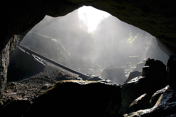 istock Foggy cave entrance, Romania 518405089