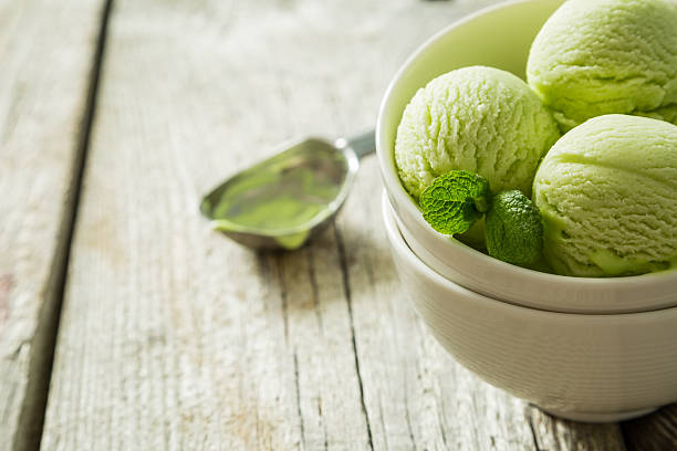 istock Pictachio ice cream in white bowl 518408046
