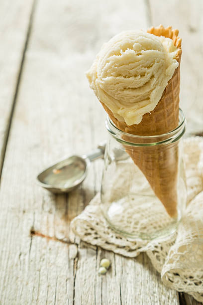 istock Vanilla ice cream in waffle cone 518408386