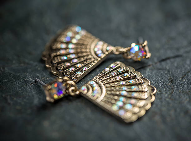 istock Fan shaped metal earrings 518409544