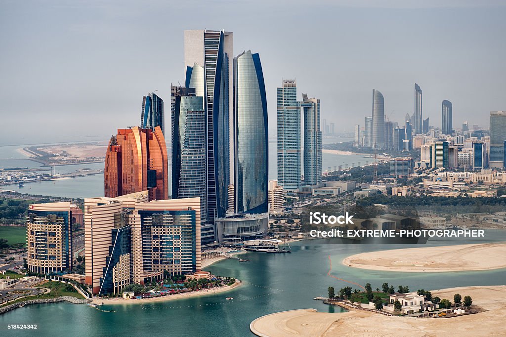 National landmarks Helicopter point of view of Abu Dhabi skyline with surrounding area. Abu Dhabi Stock Photo