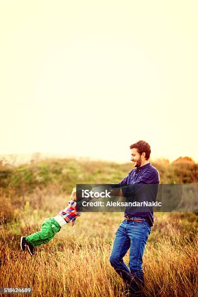 Playing With My Daddy Stock Photo - Download Image Now - 12-17 Months, Adult, Affectionate