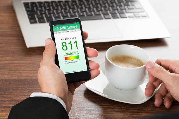 istock Businessman Checking Credit Score On Cellphone 518424718