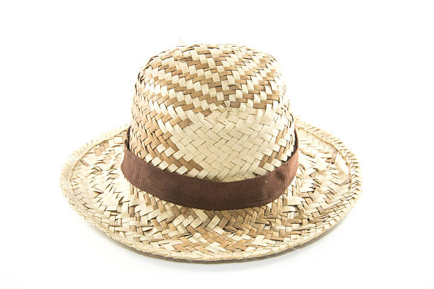 istock Straw Woven Hat with Brown Band isolated 518425113
