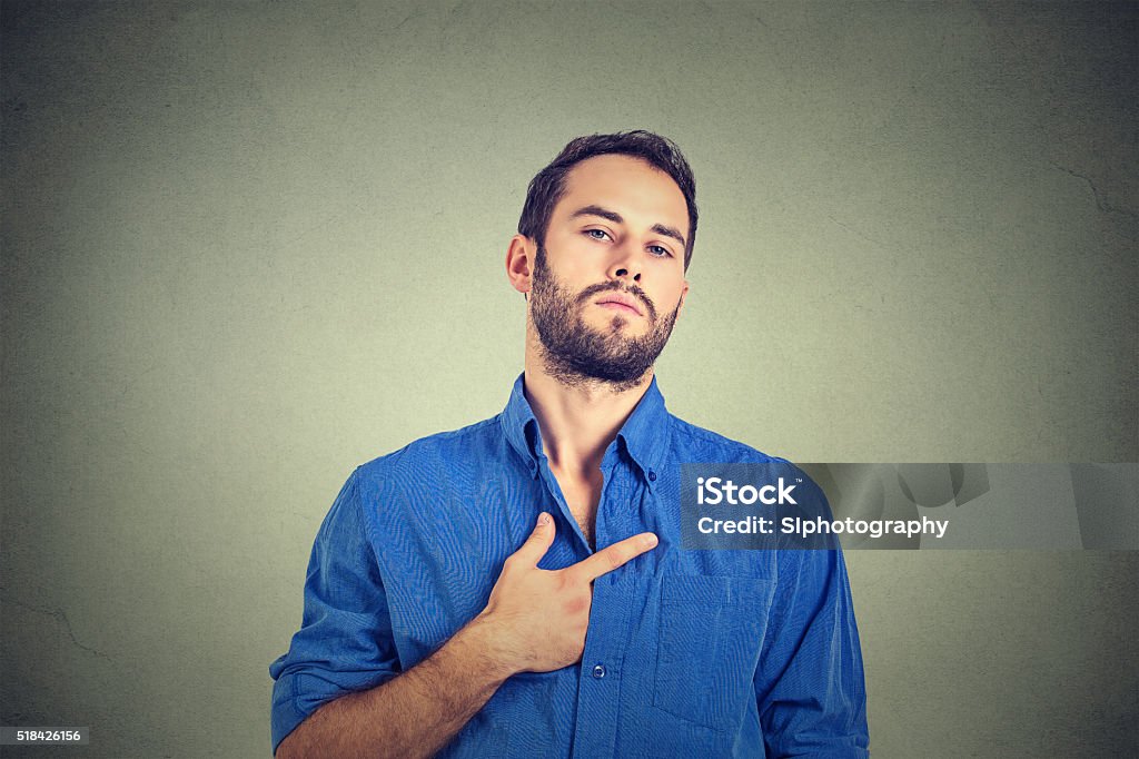 arrogant bold self important stuck up man Closeup portrait arrogant bold self important stuck up man with napoleon complex, short man syndrome isolated on gray wall background. Human emotion facial expression feelings Adulation Stock Photo